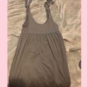 Short grey flowy dress with adjustable straps. Size Medium. In good condition.